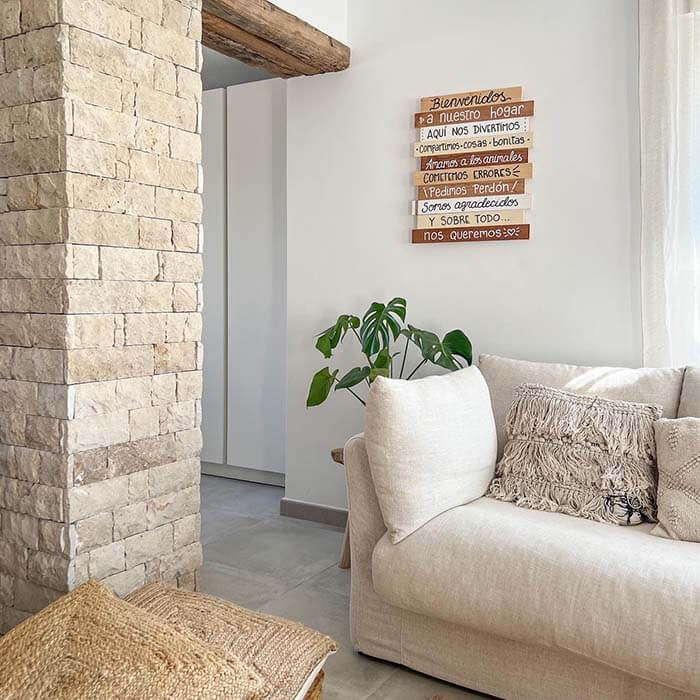 living room with natural stone wall cladding