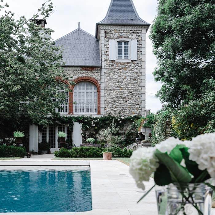 terrace pool and facade of chateau montfort